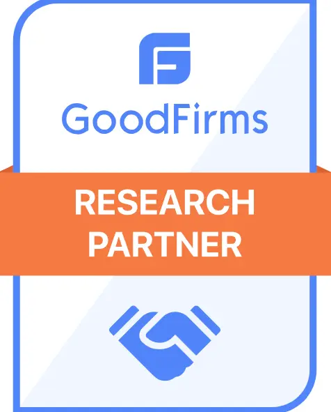 Badge featuring the GoodFirms logo and text that reads "GoodFirms RESEARCH PARTNER" with an orange banner across the middle and a blue handshake icon at the bottom.